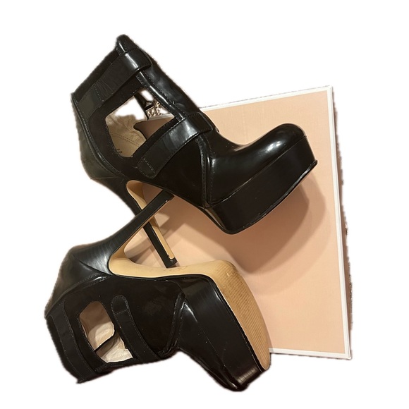 Michael Kors patent leather platform heels. Buckles and ankle height. 
Size 7M - Picture 16 of 16